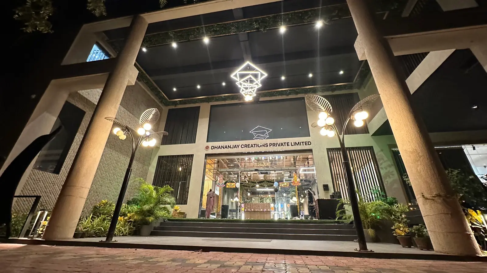 Dhananjay House, the DCPL factory in Kadodara, Surat, lit up at night