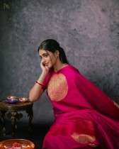 Luxurious Drapes Banarasi Silk Saree with Intricate Butta Patterns